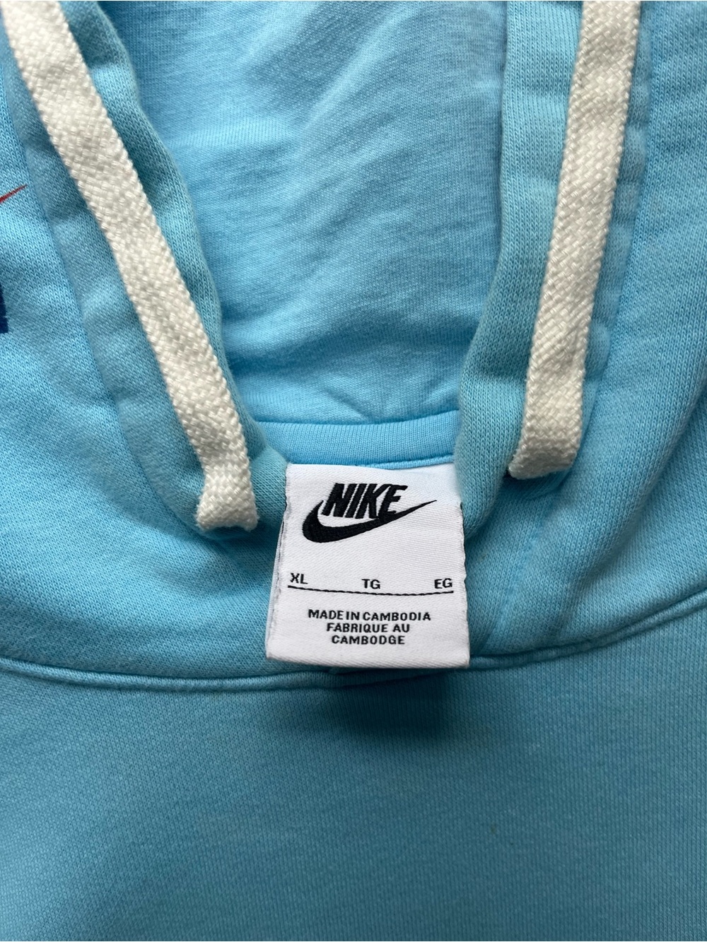 Nike Light Blue Hoodie with White Drawstrings